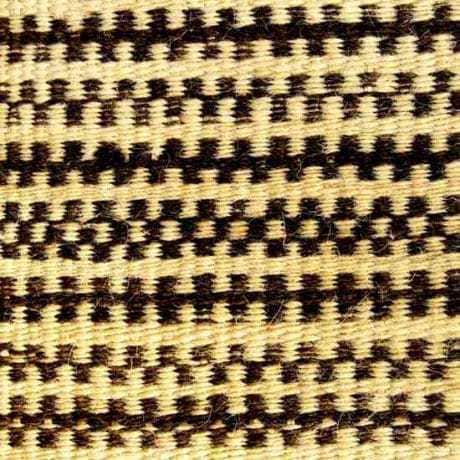 Detail polovlneného ripsového koberca. Sedlice (okr. Prešov), okolo roku 1940. Súkromný archív J. Zajonca. Foto J. Zajonc.